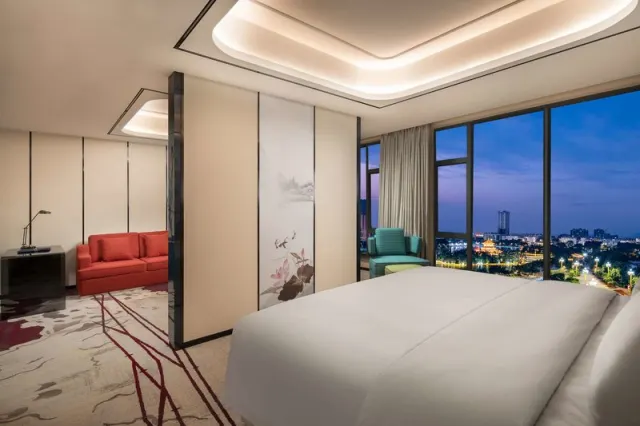 Ramada by Wyndham Mengzi Suites - foto 2